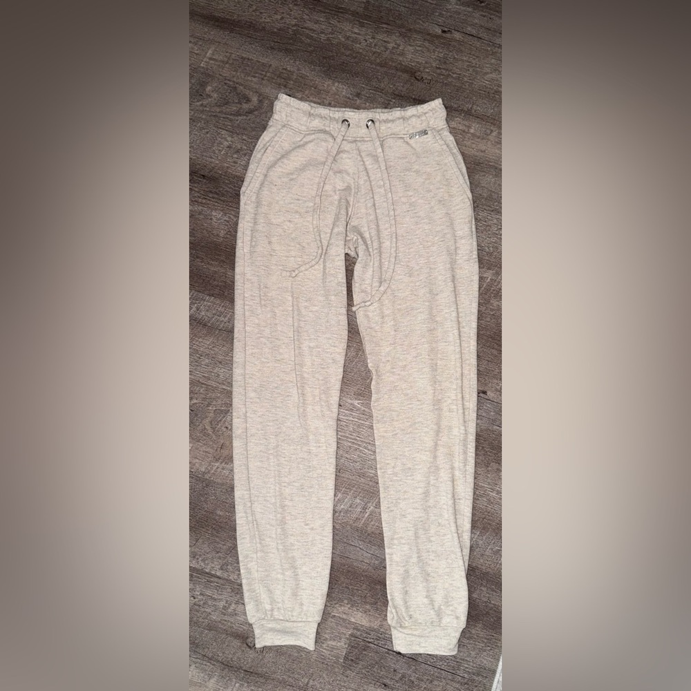 Bombshell Sportswear Cream Track Pants with Elastic Cuffs